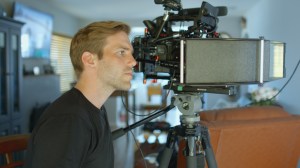 THE WHALE DETECTIVE aka filmmaker Tom Mustill interviews a fellow whale "near-miss" survivor. Photo ©Tim Burgess.