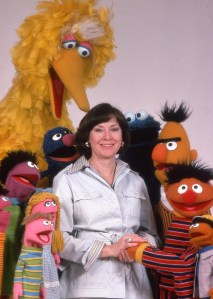 Joan Ganz Cooney and her SESAME STREET pals. Photo courtesy Sesame Workshop.